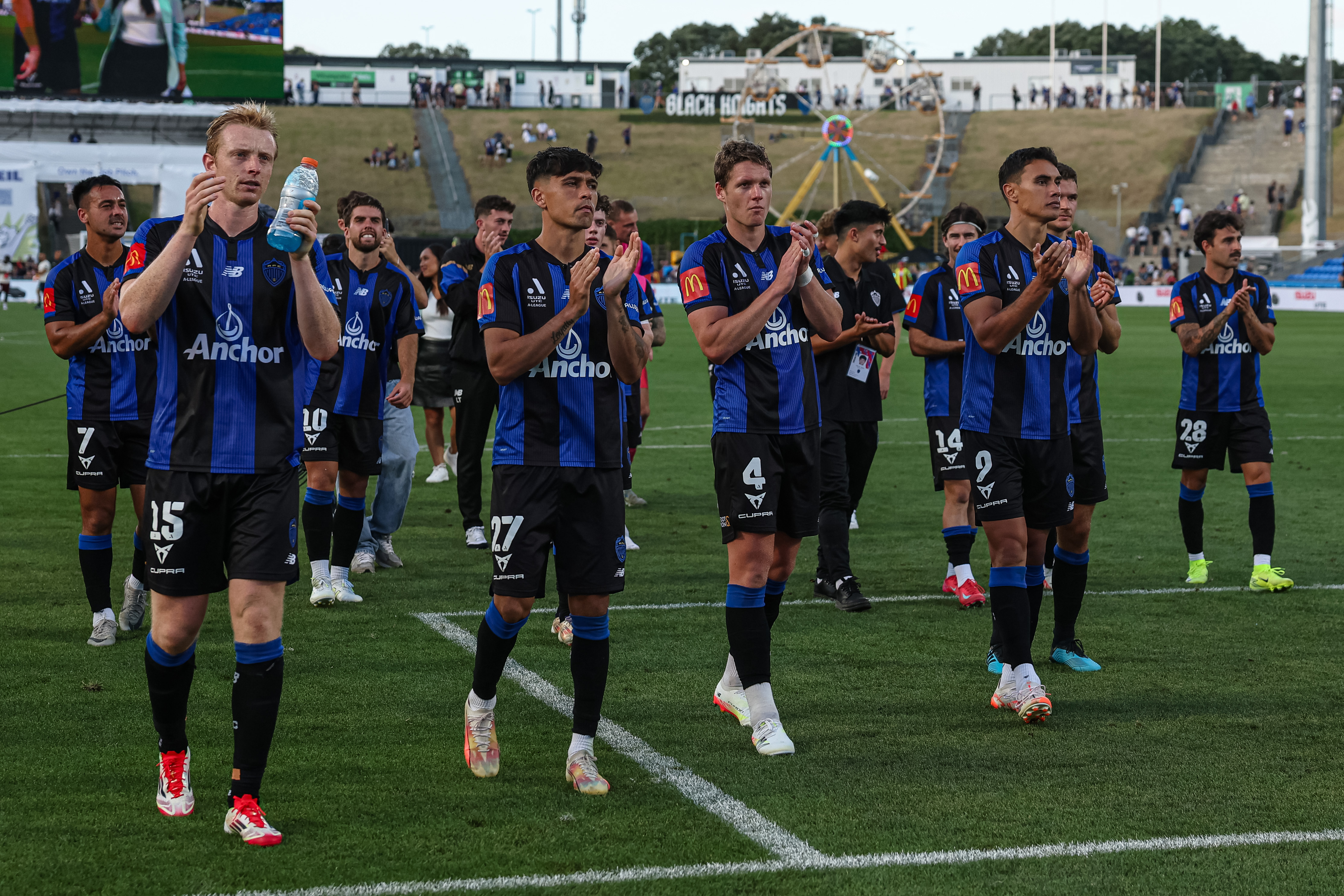 Auckland FC players thank the fans after their draw with Adelaide United. Photo / Photosport