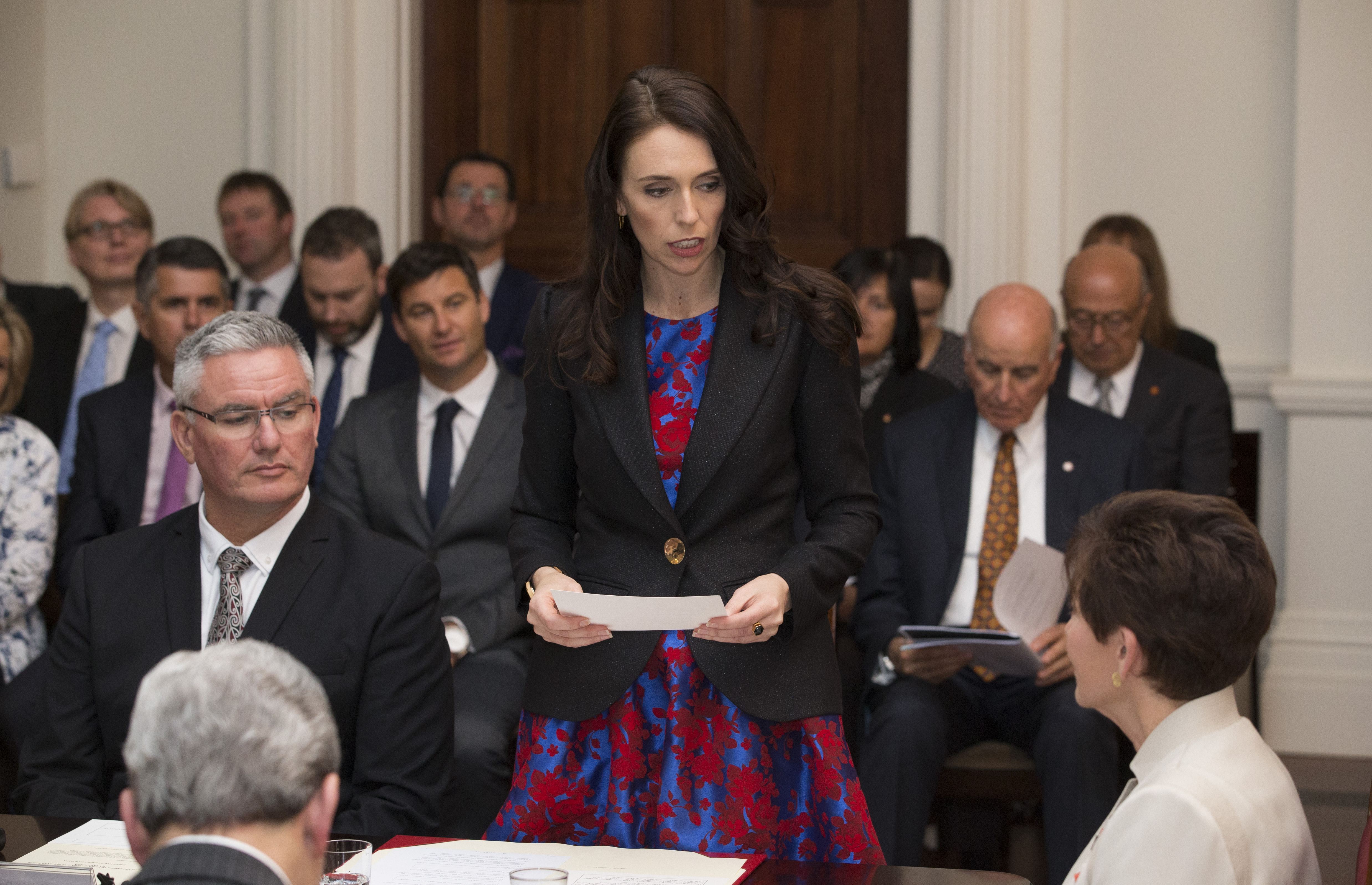 Jacinda Ardern, wearing Kate Sylvester, reads the oath during her Government’s swearing-in ceremony at Government House in Wellington in 2017. Photo / Mark Mitchell