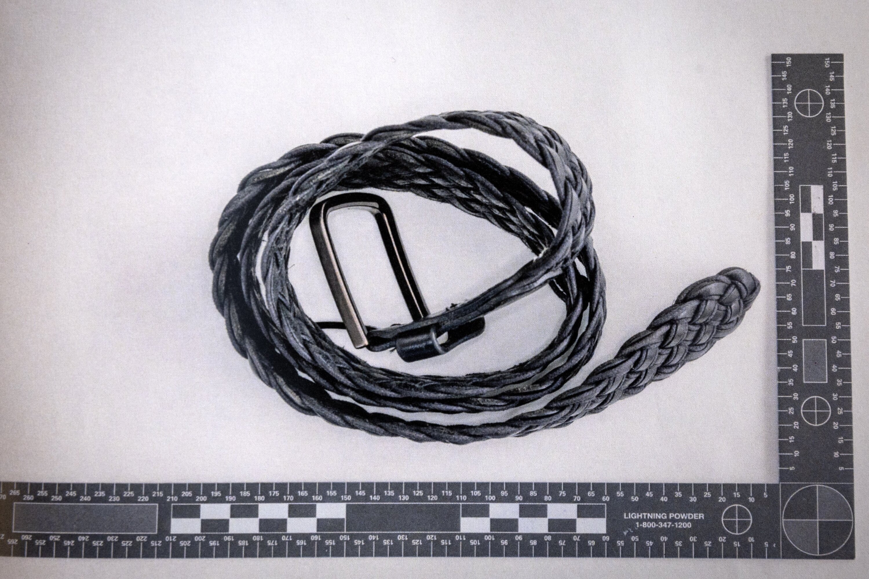 Photo of a leather belt from inside eye surgeon Philip Polkinghorne's Remuera home have been entered into evidence at his murder trial in the High Court of Auckland. He is accused of having strangled wife Pauline Hanna then staging the scene to look like a suicide by hanging.