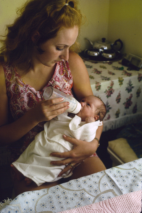 Julia Hartley-Moore feeding her eldest child, Karoline. Photo / Supplied
