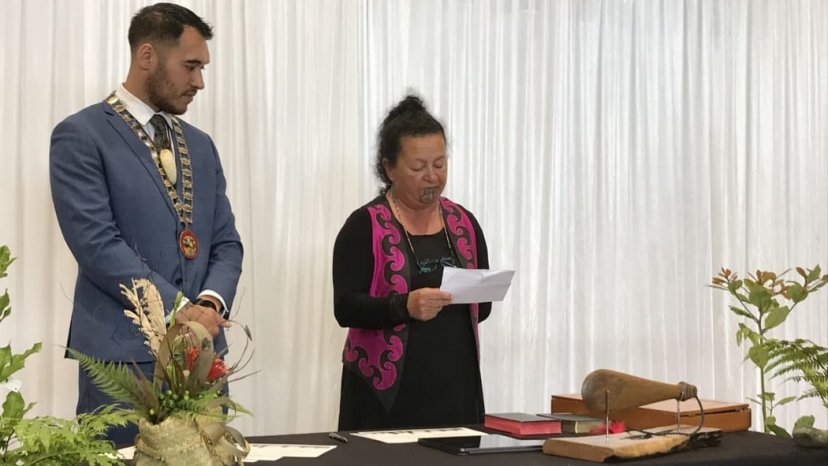 Far North Mayor Moko Tepania watches as Hilda Halkyard-Harawira was sworn-in as a Māori ward councillor. Photo / Susan Botting, LDR