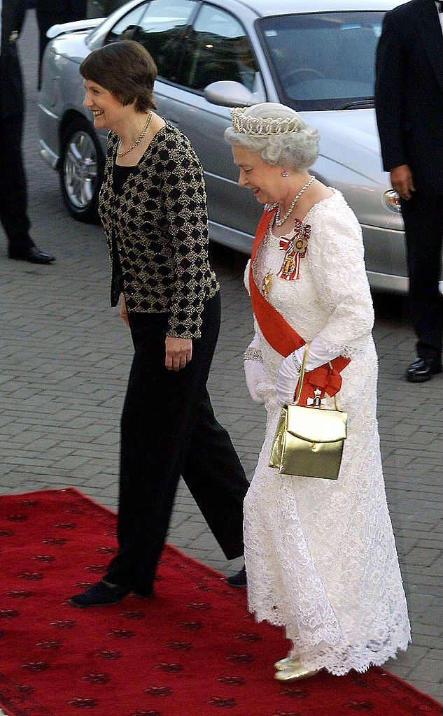 Queen Elizabeth II and New Zealand Prime Minister Helen Clark arrive for a state dinner at Parliament House in February 2002. Photo / Getty Images