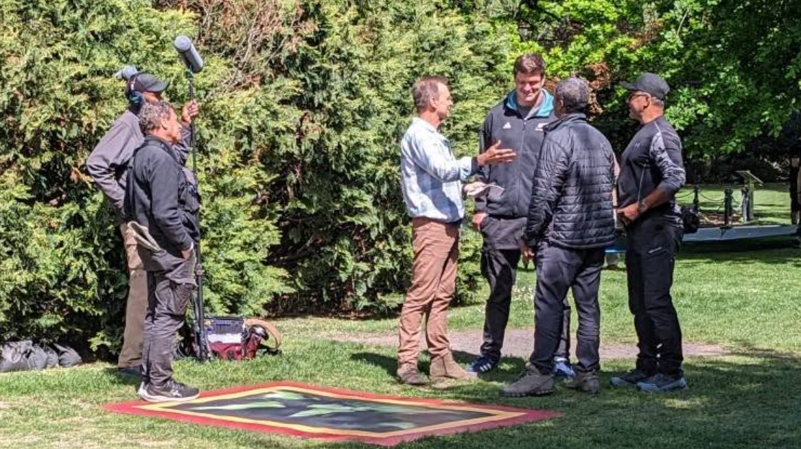 Amazing Race host Phil Keoghan talks to All Blacks captain Scott Barrett during filming of The Amazing Race in Christchurch this week.
