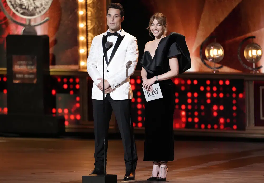 Hosts Skylar Astin, left, and Julianne Hough speak on stage. Photo / AP