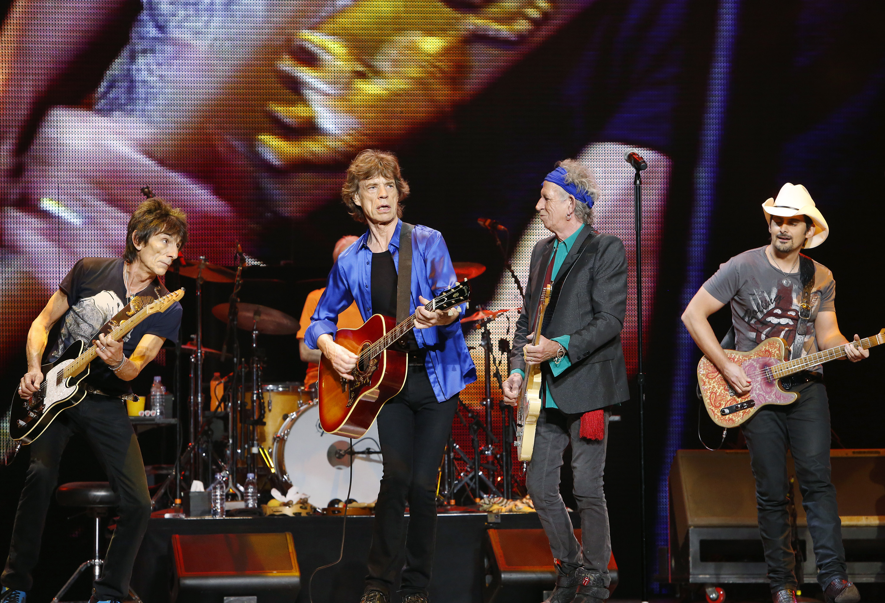 From left to right, Ronnie Wood, Mick Jagger, and Keith Richards of the Rolling Stones, and guest star Brad Paisley perform at the Wells Fargo Center in Philadelphia. Photo / AP