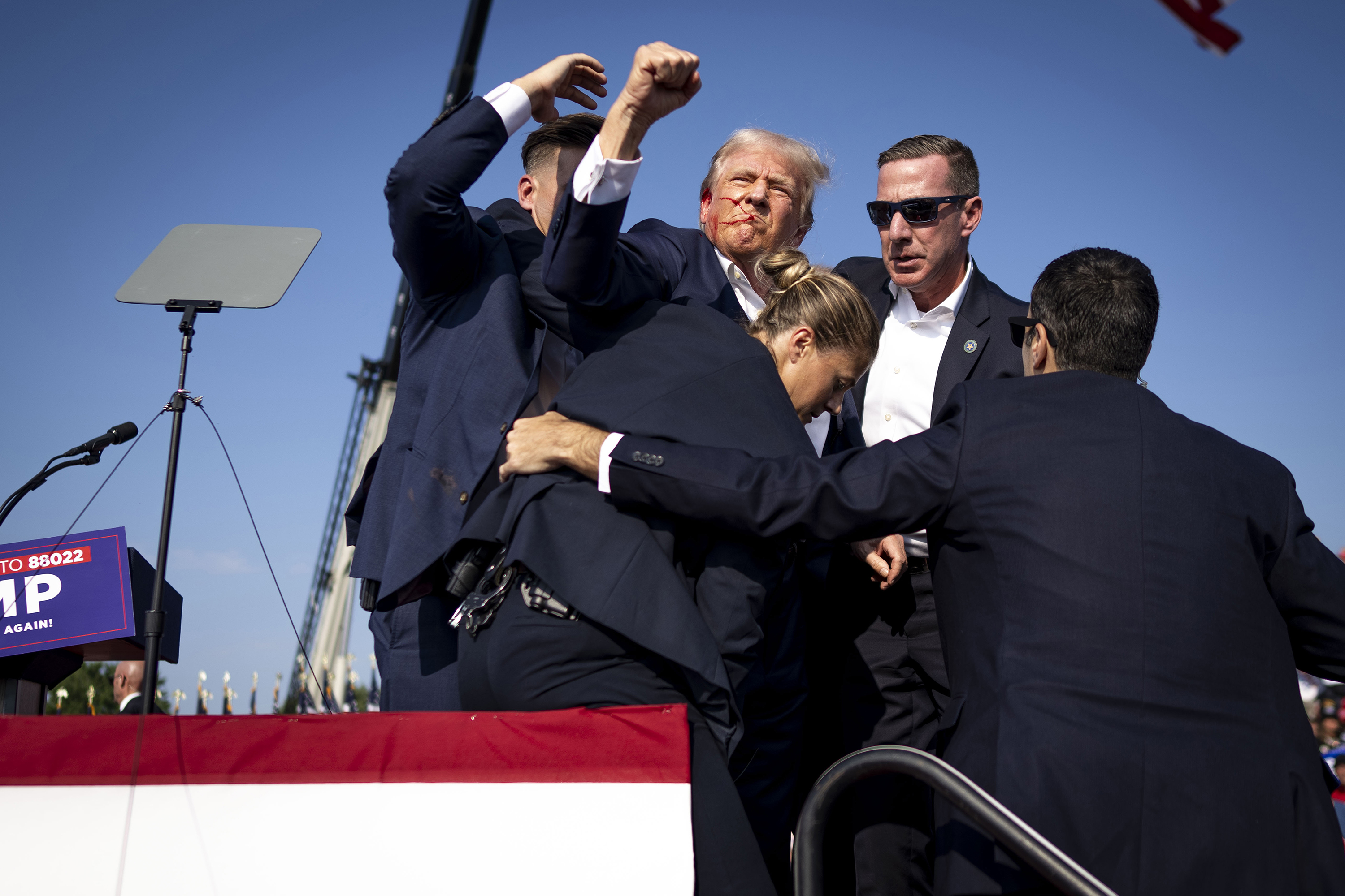 A photo of former President Donald Trump raising his fist after he was shot during a campaign rally is becoming one of the defining images of the attack. Photo / Doug Mills, The New York Times