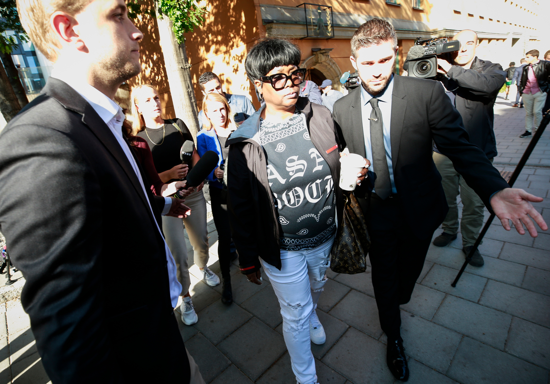 Renee Black, centre, mother of American rapper A$AP Rocky, leaves the district court in Stockholm. Photo / AP.