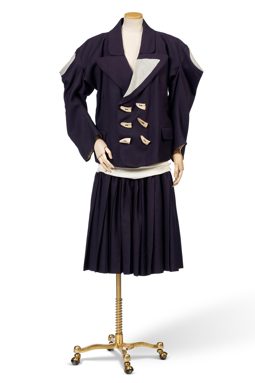 A navy blue serge two-piece suit from Vivienne Westwood's autumn-winter 1983 collection 'Witches'. Photo / Christies