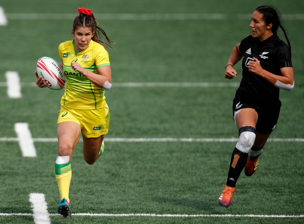Hirini hunts down Aussie star Charlotte Caslick. Photo / Getty Images