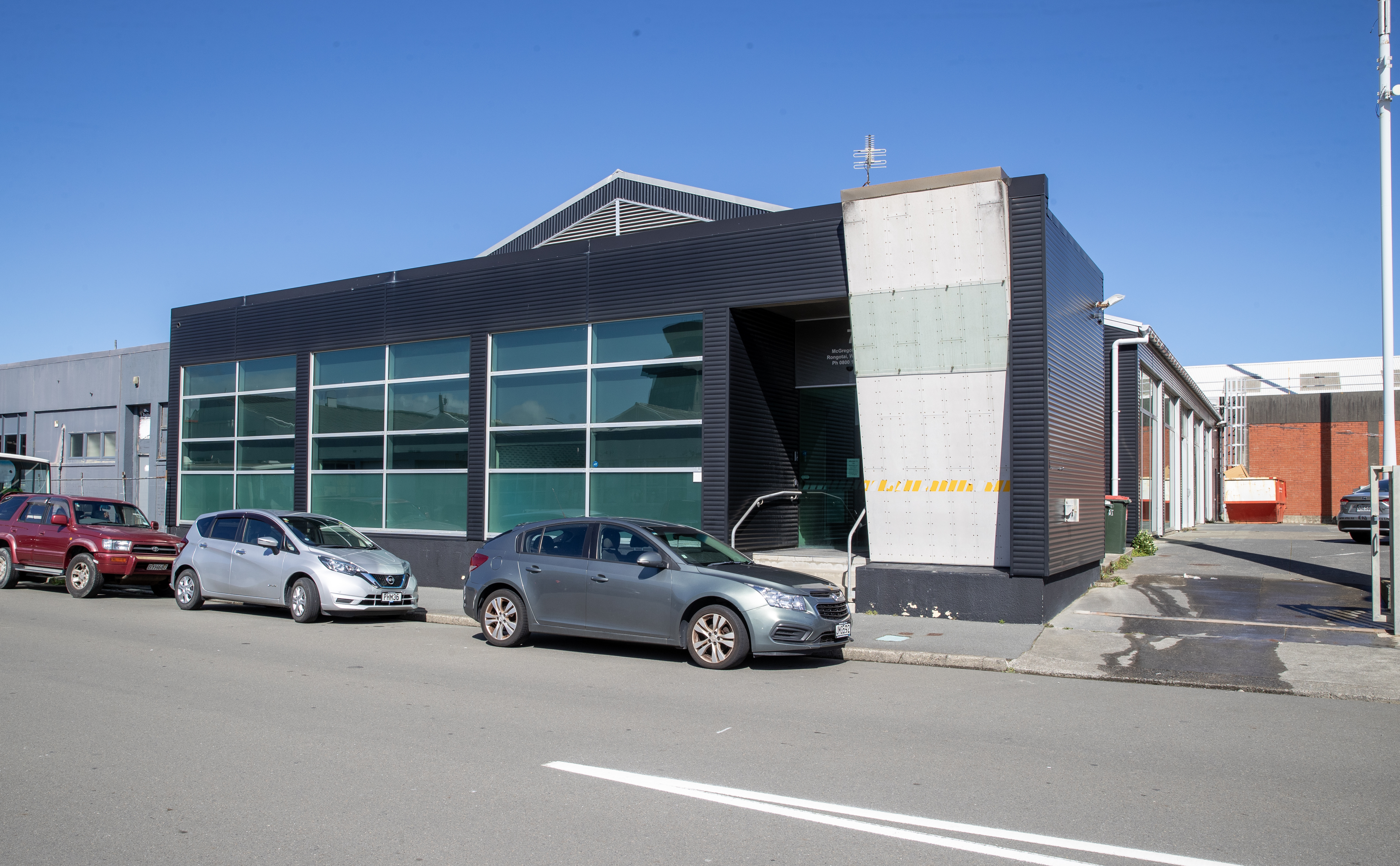 The recently-vacated E Tu building is the last in a block near Wellington Airport yet to be bought up by Sir Peter Jackson. Photo / Mark Mitchell