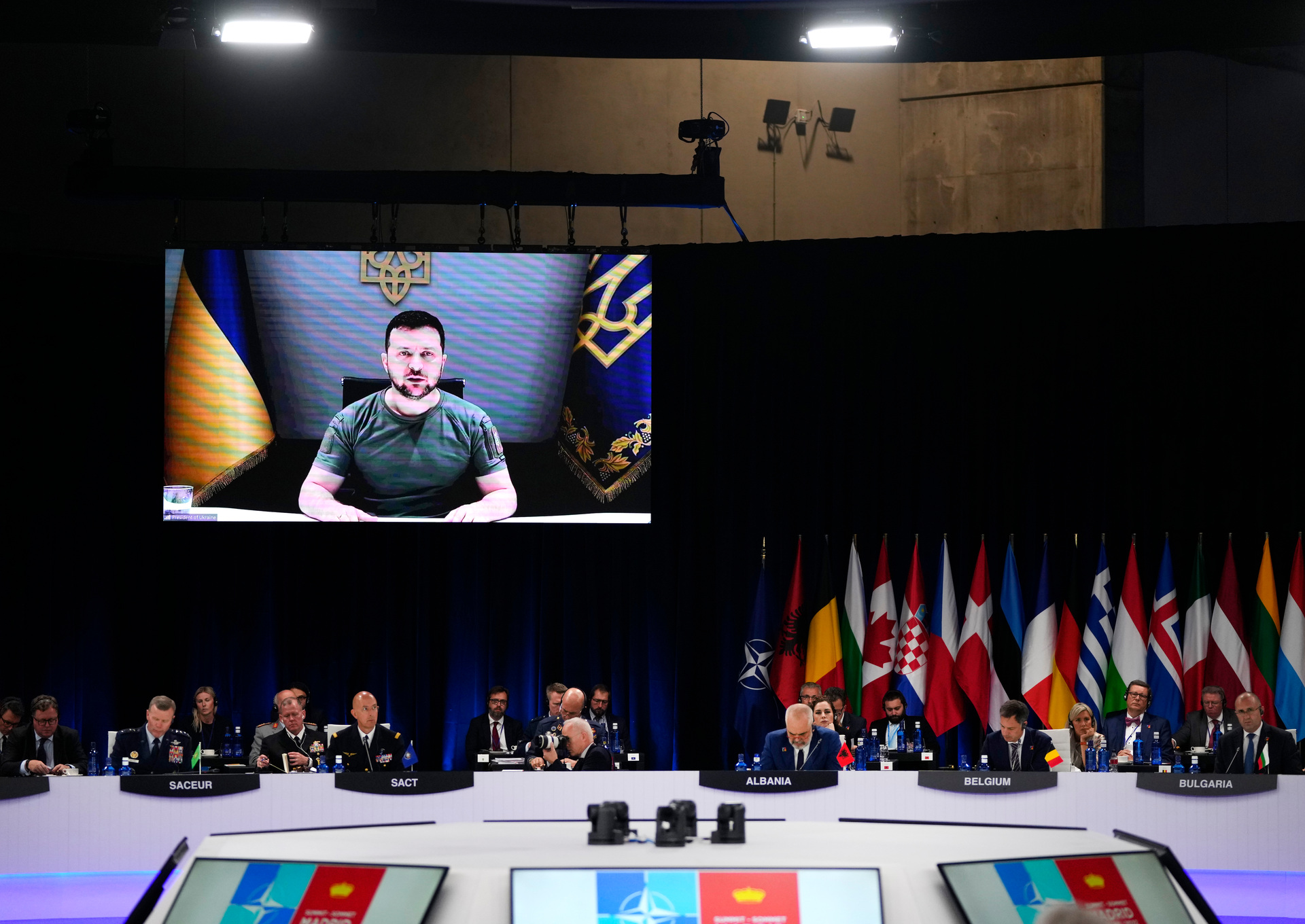 Ukraine's President Volodymyr Zelenskyy addresses leaders via a video screen during a round table meeting at a Nato summit. Photo / Manu Fernandez, AP