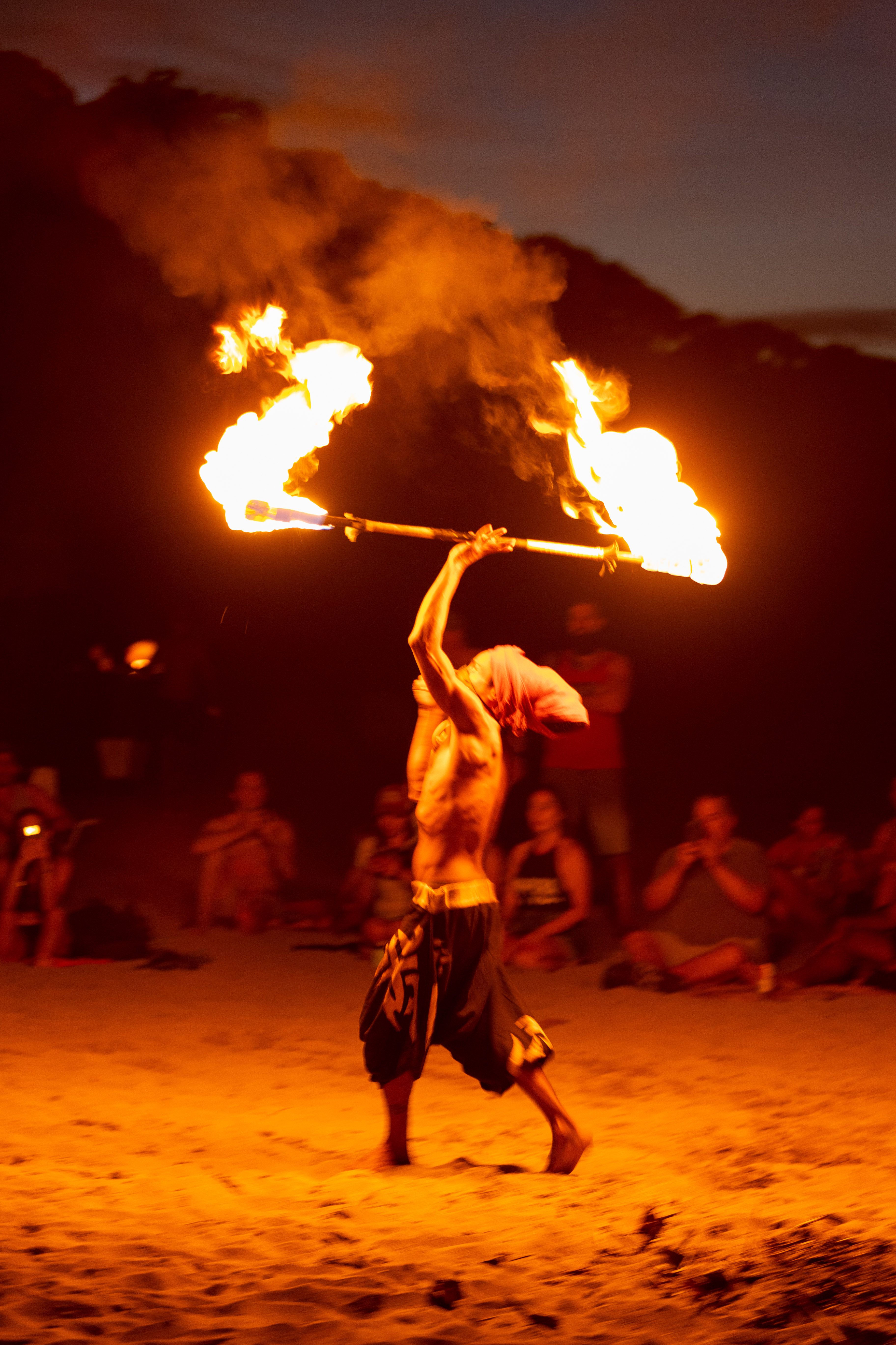 Fire dancing on the beach. Photo / Danilophoto