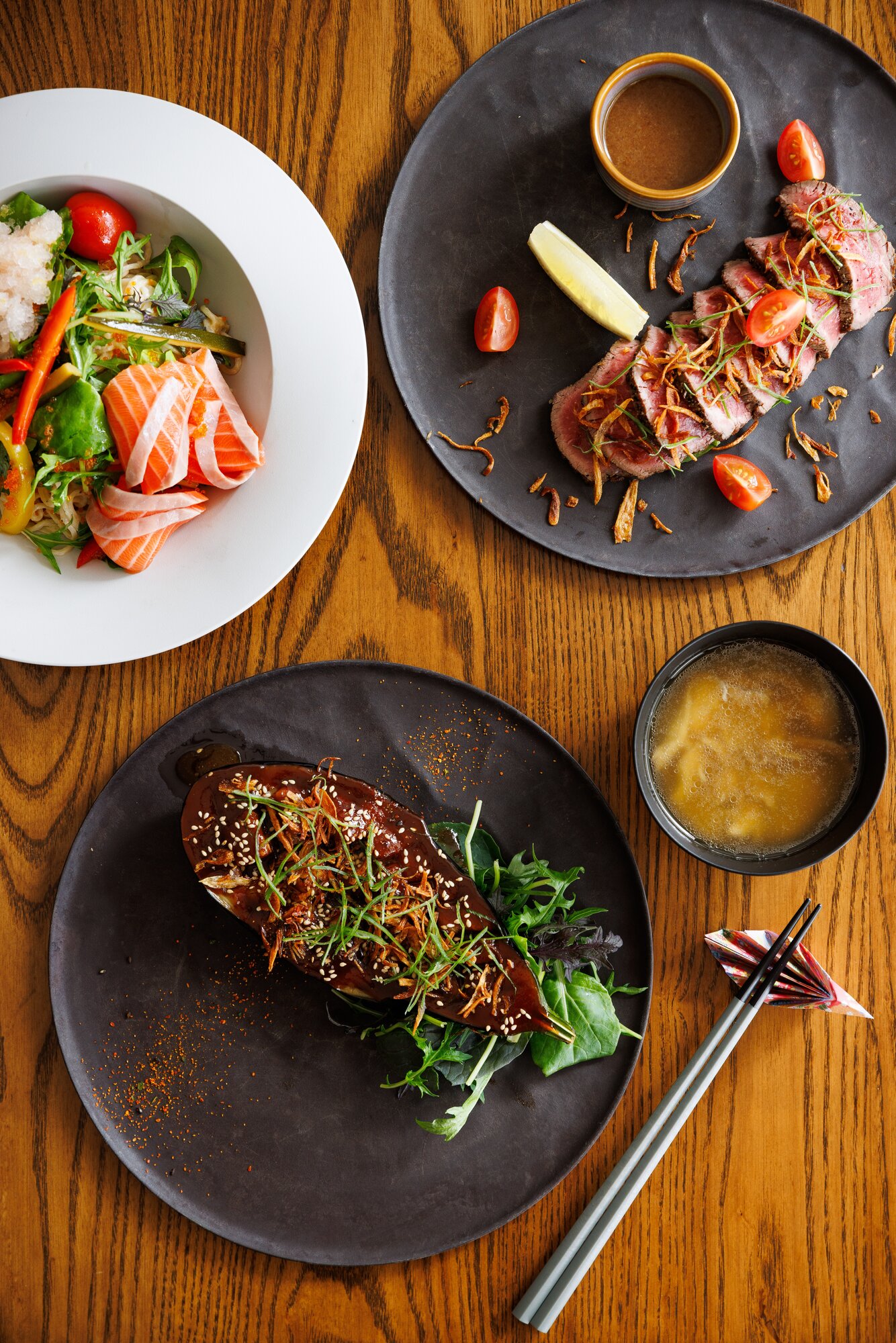 The Miso eggplant, cold salmon ramen and Beef tataki on the menu at Japanese restaurant Hocho in Westmere. Photo / Babiche Martens