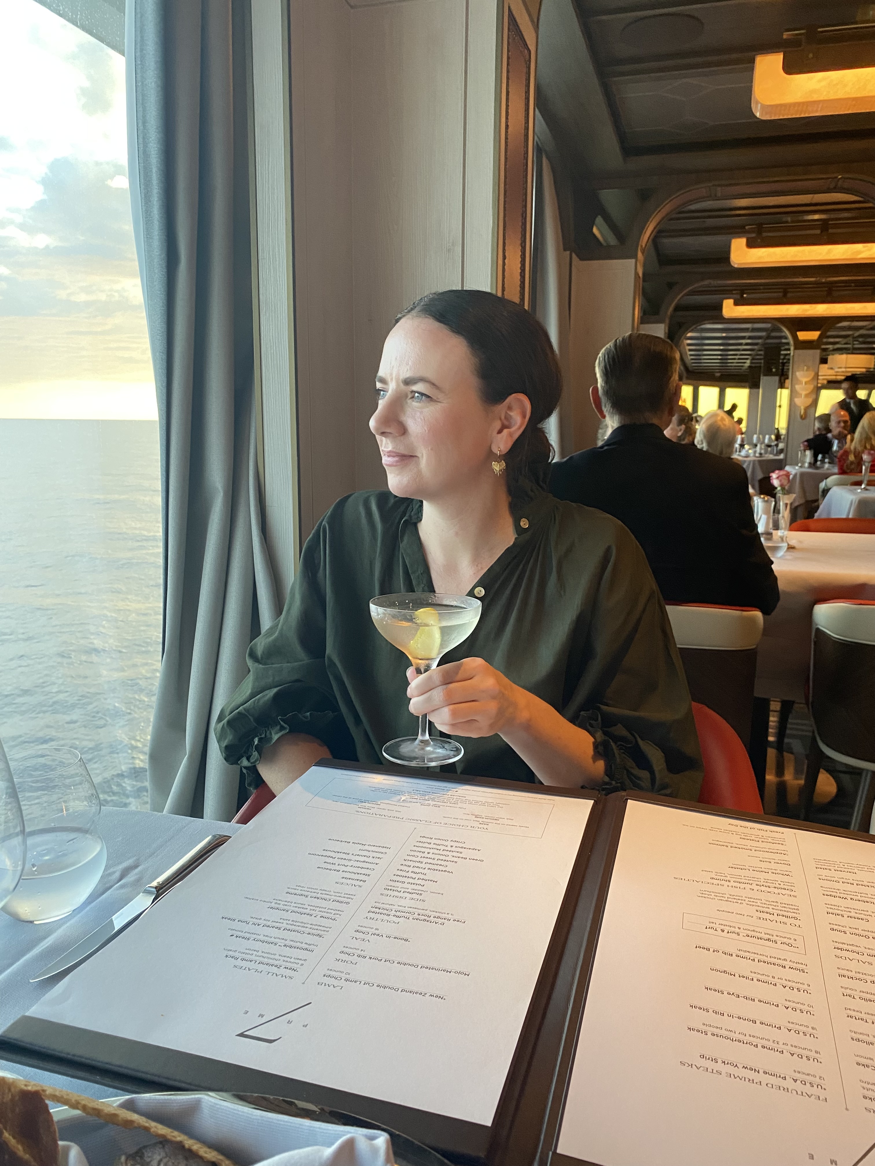 Johanna Thornton dining at Prime 7 on Regent Seven Seas Grandeur.
