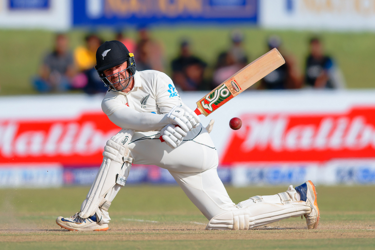 Tom Blundell sweeps against India. Photo / Photosport
