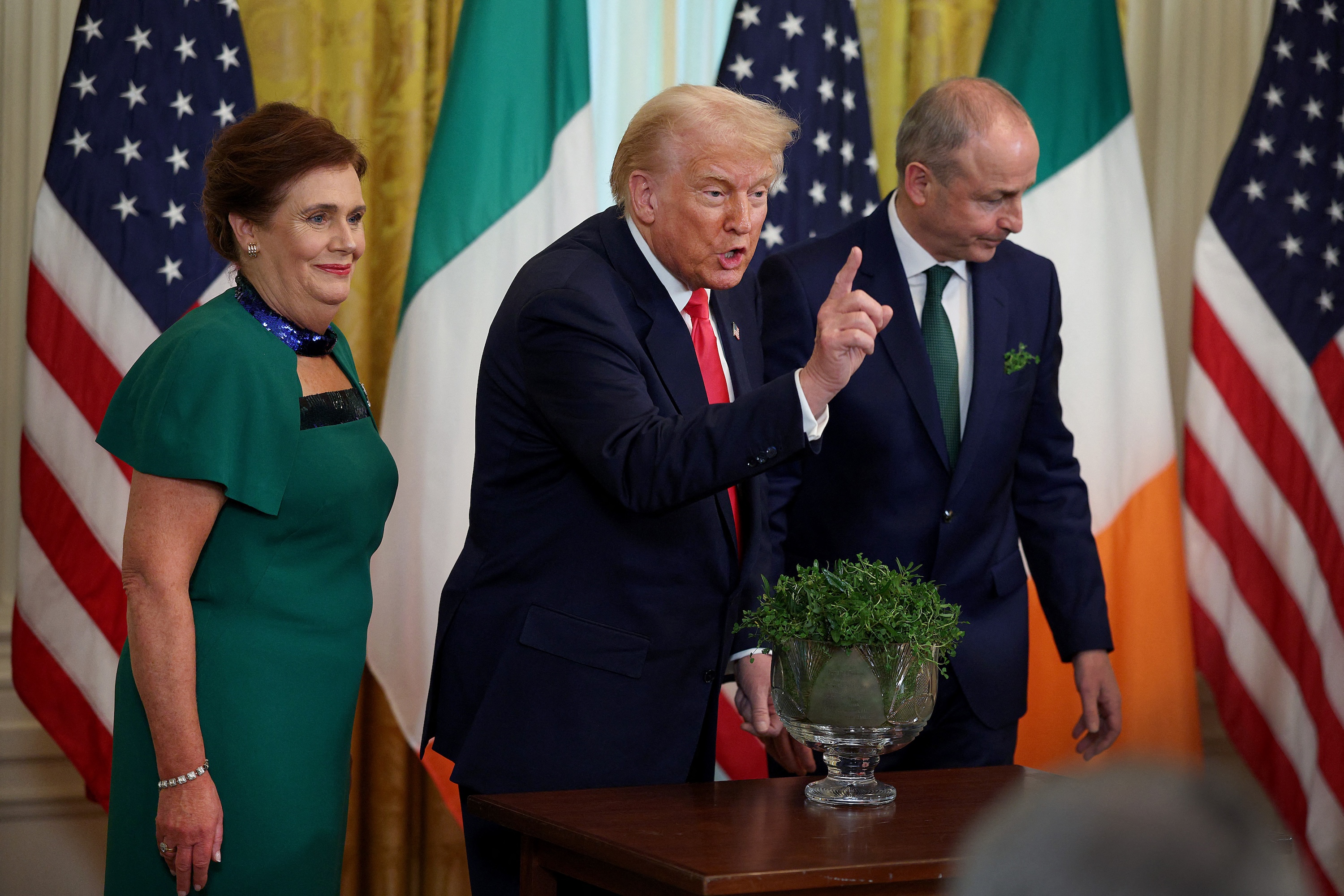 US President Donald Trump meets with Irish Taoiseach Micheál Martin and his wife Mary O'Shea during a St Patrick's Day event in the East Room of the White House on March 12. Photo / AFP