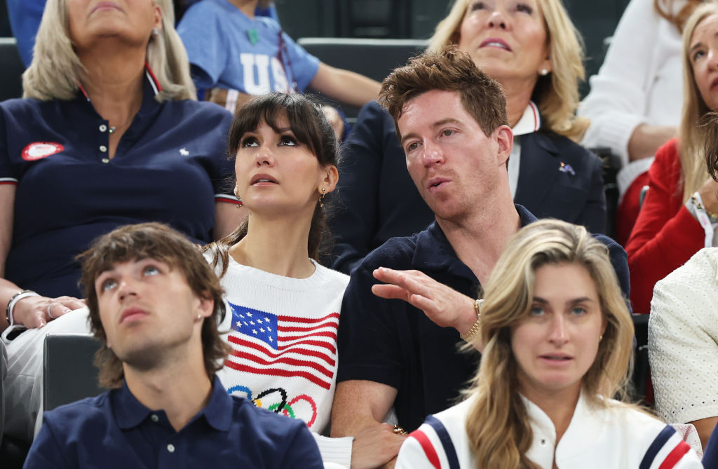 Nina Dobrev (left) and Shaun White look on during the Artistic Gymnastics Women's Qualification on day two. Photo / Getty Images