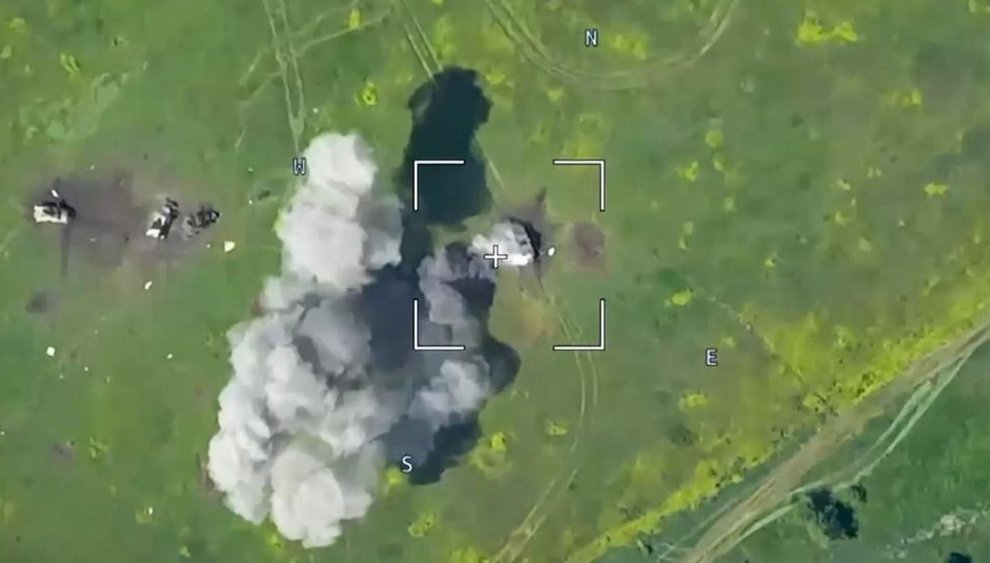 A Ukrainian military vehicle being hit during a combat in Ukraine. Photo / AP