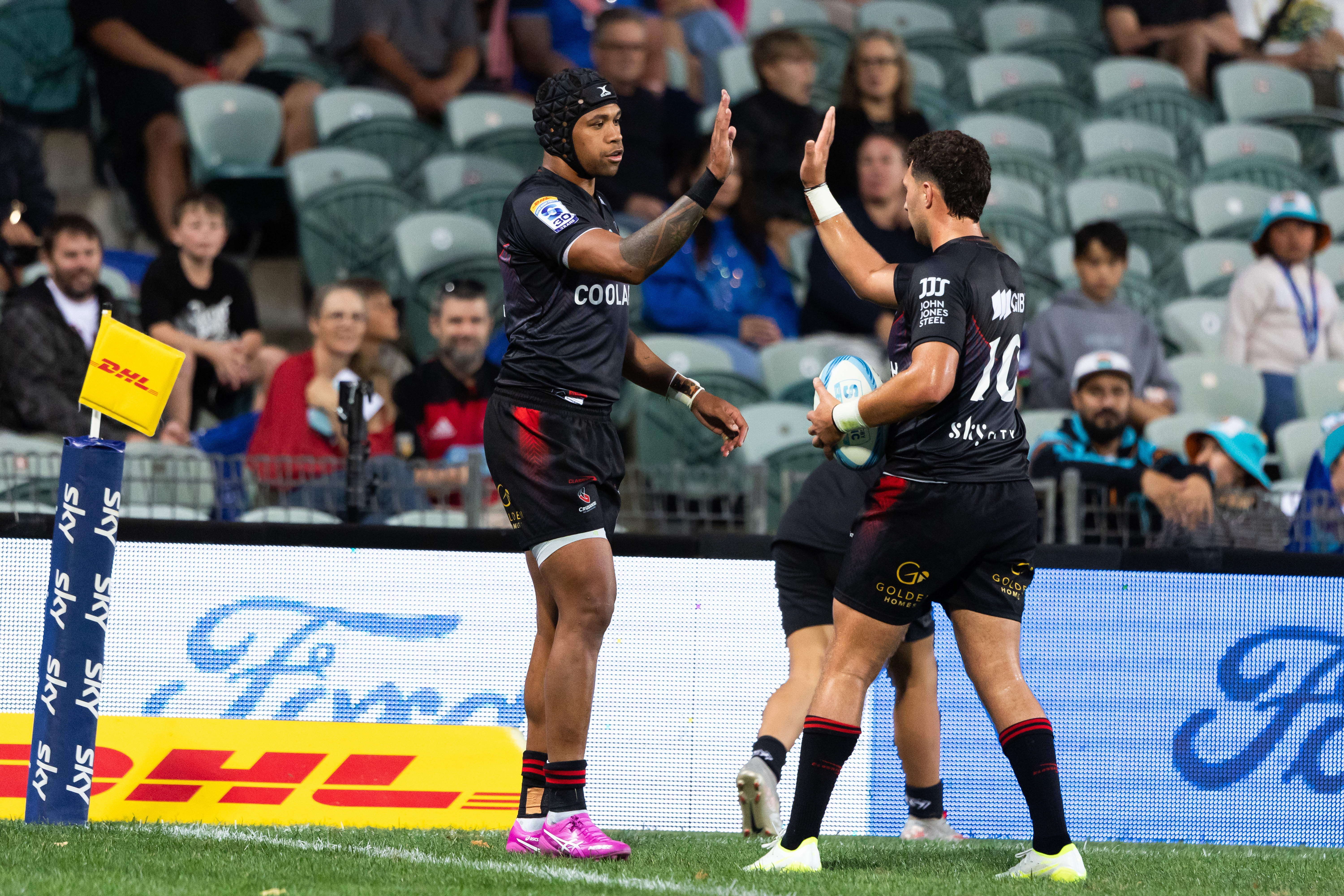 Chay Fihaki (left) scored a double in the Crusaders' win over Moana Pasifika. Photo / Photosport