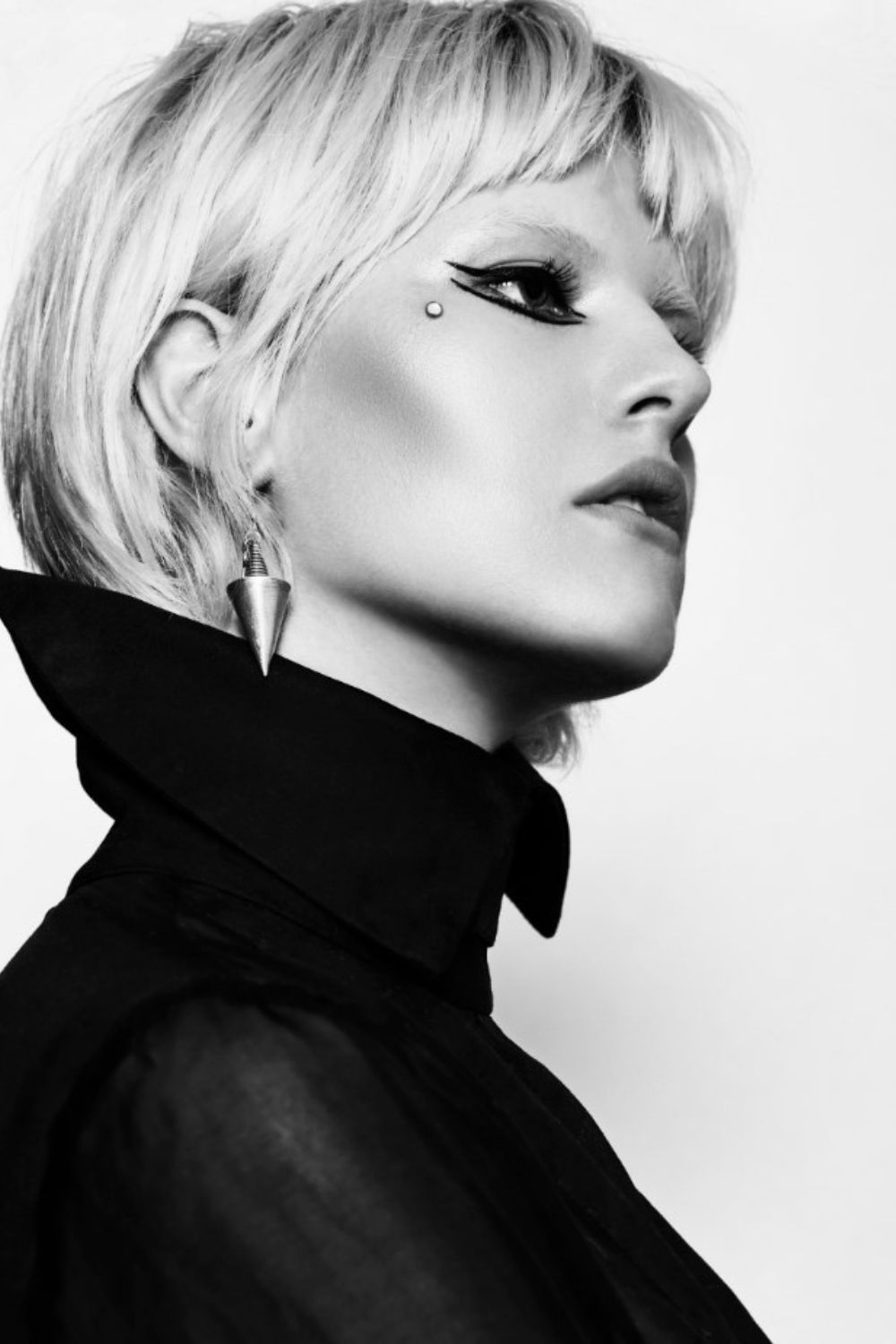 Olive wears model's own blouse and earrings. Photo / Carolyn Haslett