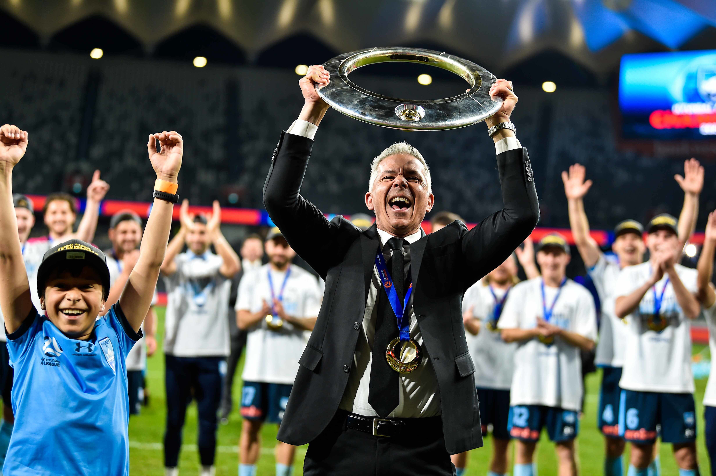 Steve Corcia celebrating as Sydney FC manager after they claimed a historic fifth A-League crown after beating Melbourne City 1-0 in 2019/20. Photo / Photosport