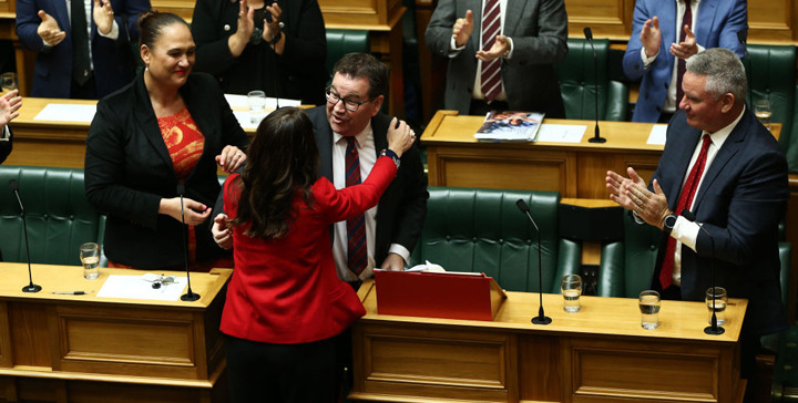 Finance Minister Grant Robertson receiving a hug from Prime Minister Jacinda Ardern after reading his Wellbeing Budget 2019. Photo / Mark Mitchell