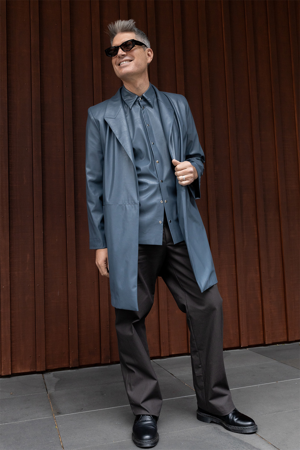 Mulligan in Zambesi ‘Patina’ coat and ‘Sheen’ shirt, paired with ‘Detail’ casual trousers in a chequered brown cotton and Dr Martens shoes. Photo / Katie Begbie