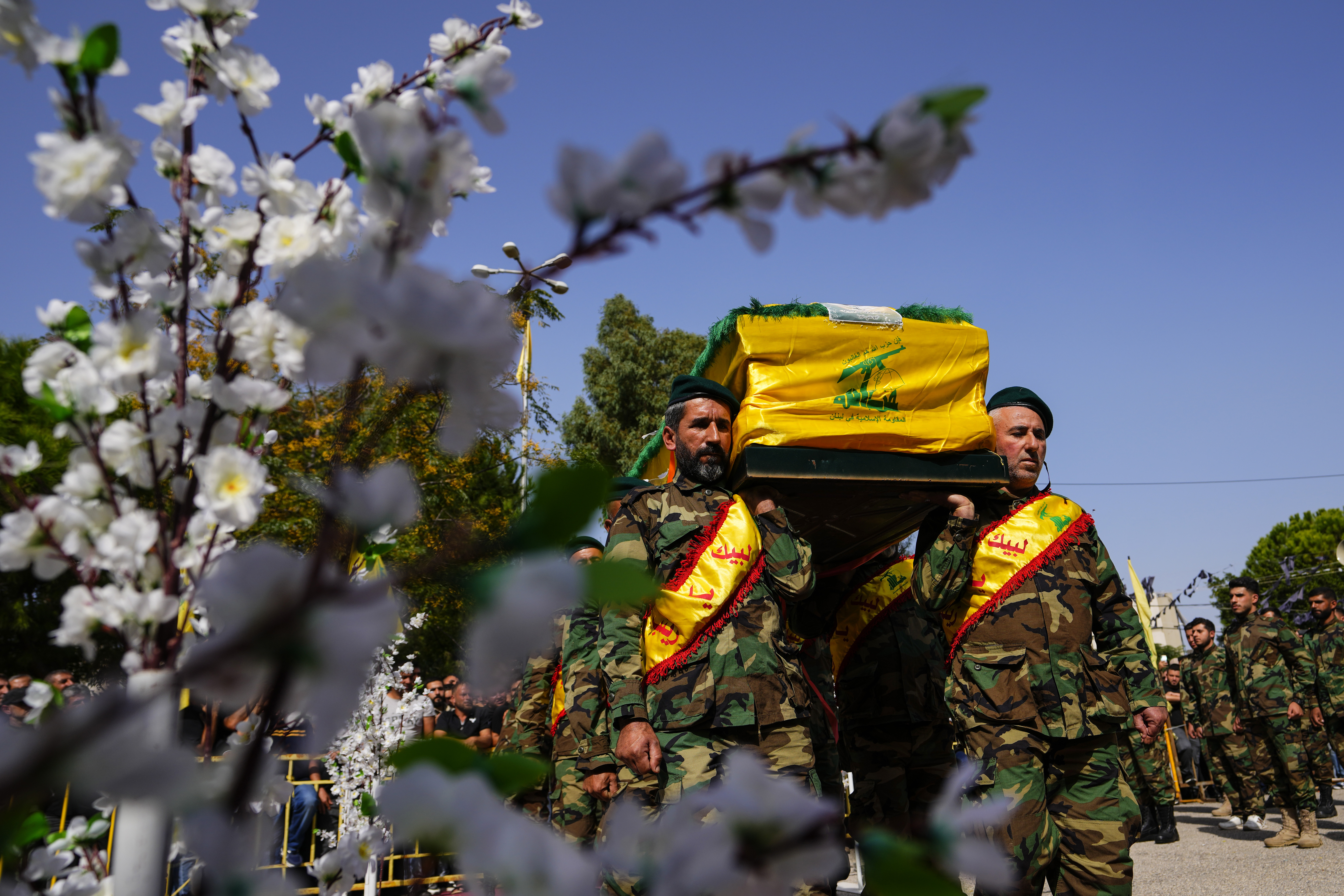 People carry the coffin of Hezbollah fighter, Bilal Nemr Rmeiti, who was killed by Israeli shelling, during his funeral procession in Majadel village. Photo / AP