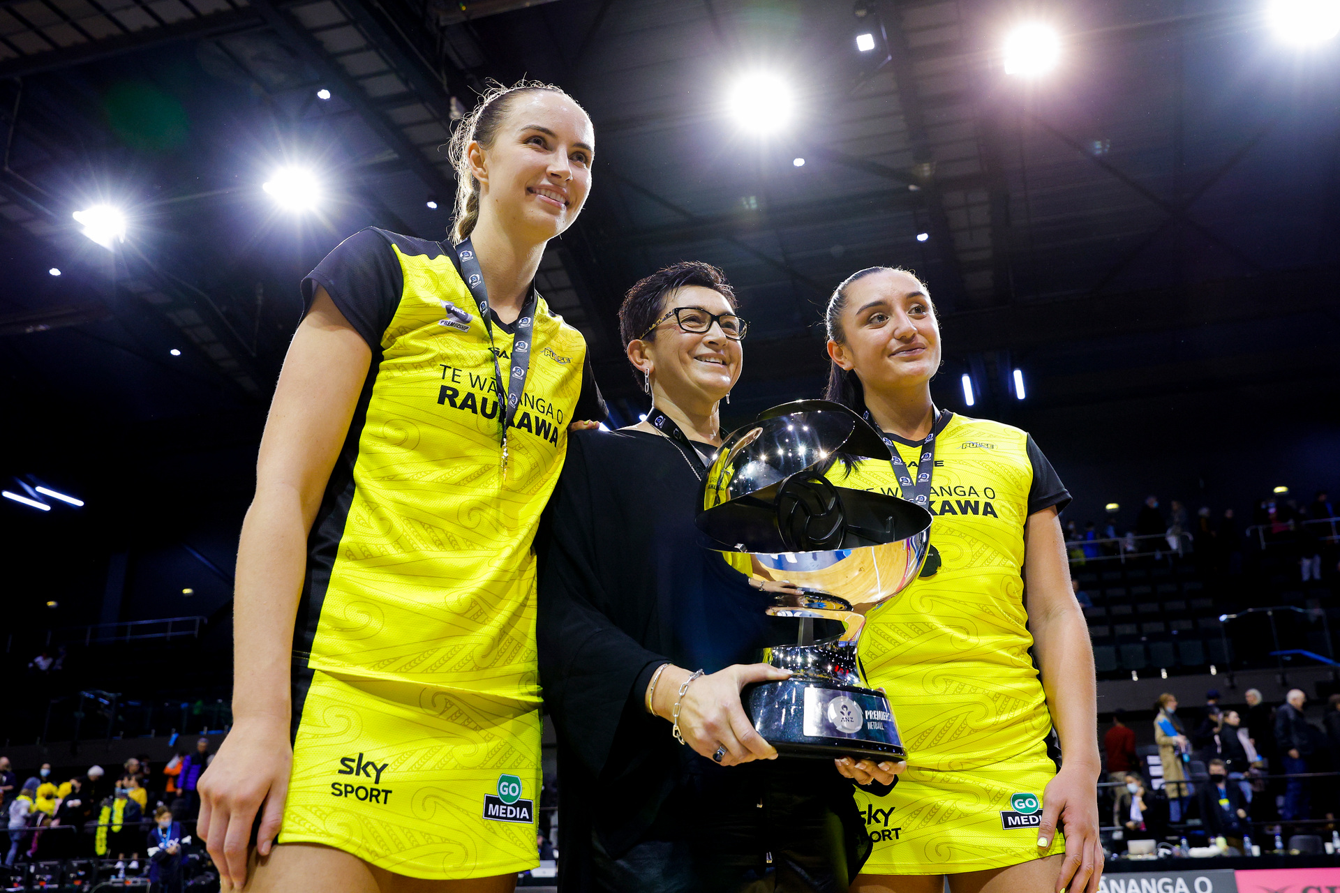 Coach Yvette McCausland-Durie and Tiana Metuarau of the Pulse pose with the ANZ Premiership trophy during the 2022 ANZ Premiership. Photo / Getty