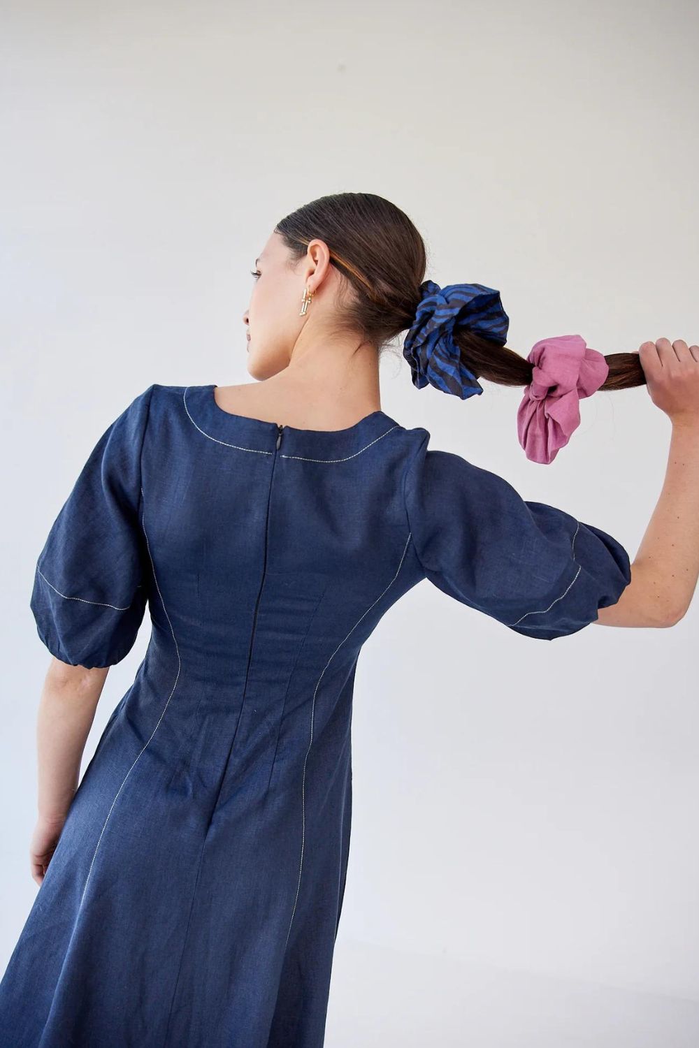 Double take: Twist two scrunchies into a ponytail or braid for extra visual interest. Photo / Hej Hej