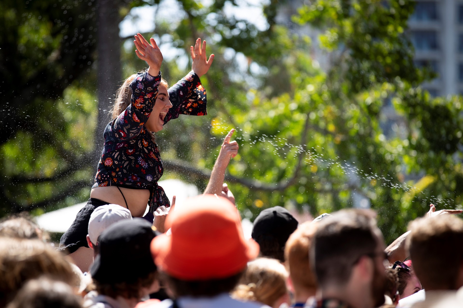 Staff sprayed water into the crowd to keep them cool. Photo / Dean Purcell, New Zealand Herald
