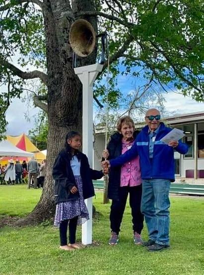Peria School’s original bell was rung to mark the school’s 150th celebrations by ex student Neil Olsen, 97, and his wife Zoe and current student Rangimaria Raumati-Nathan.