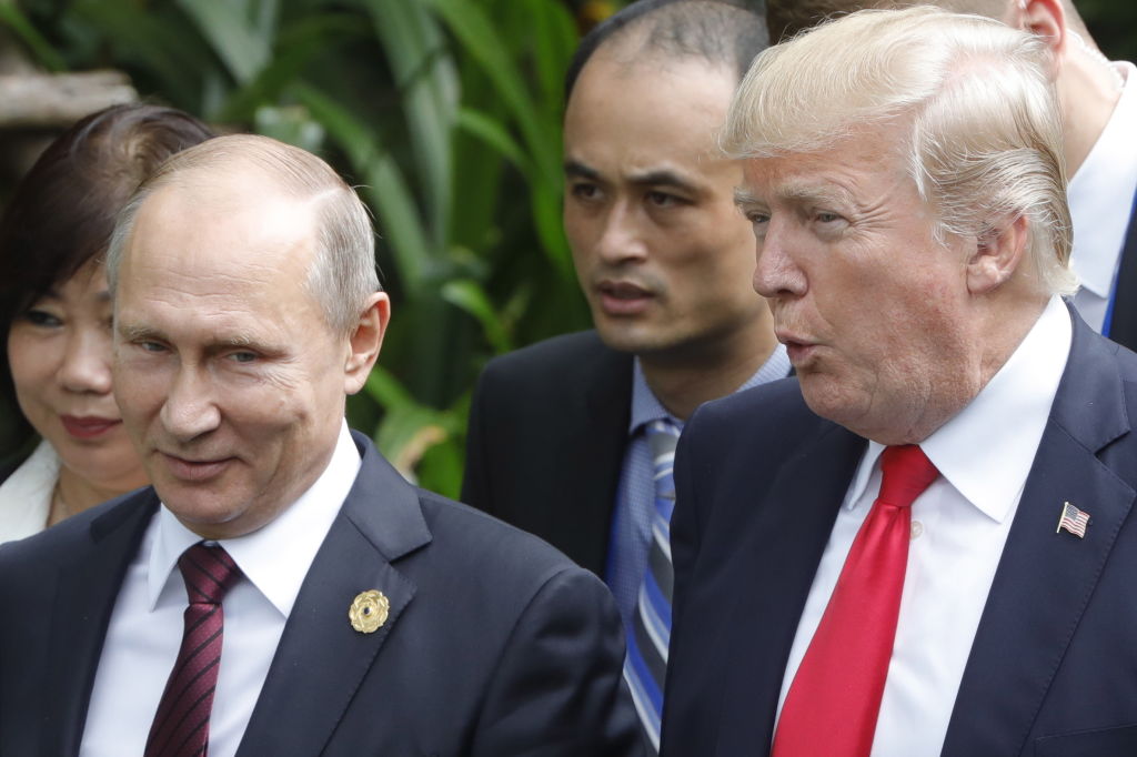 Vladimir Putin and US president Donald Trump have met on a number of occasions - here they are on the closing day of the APEC Summit on November 11, 2017. Photo / Getty