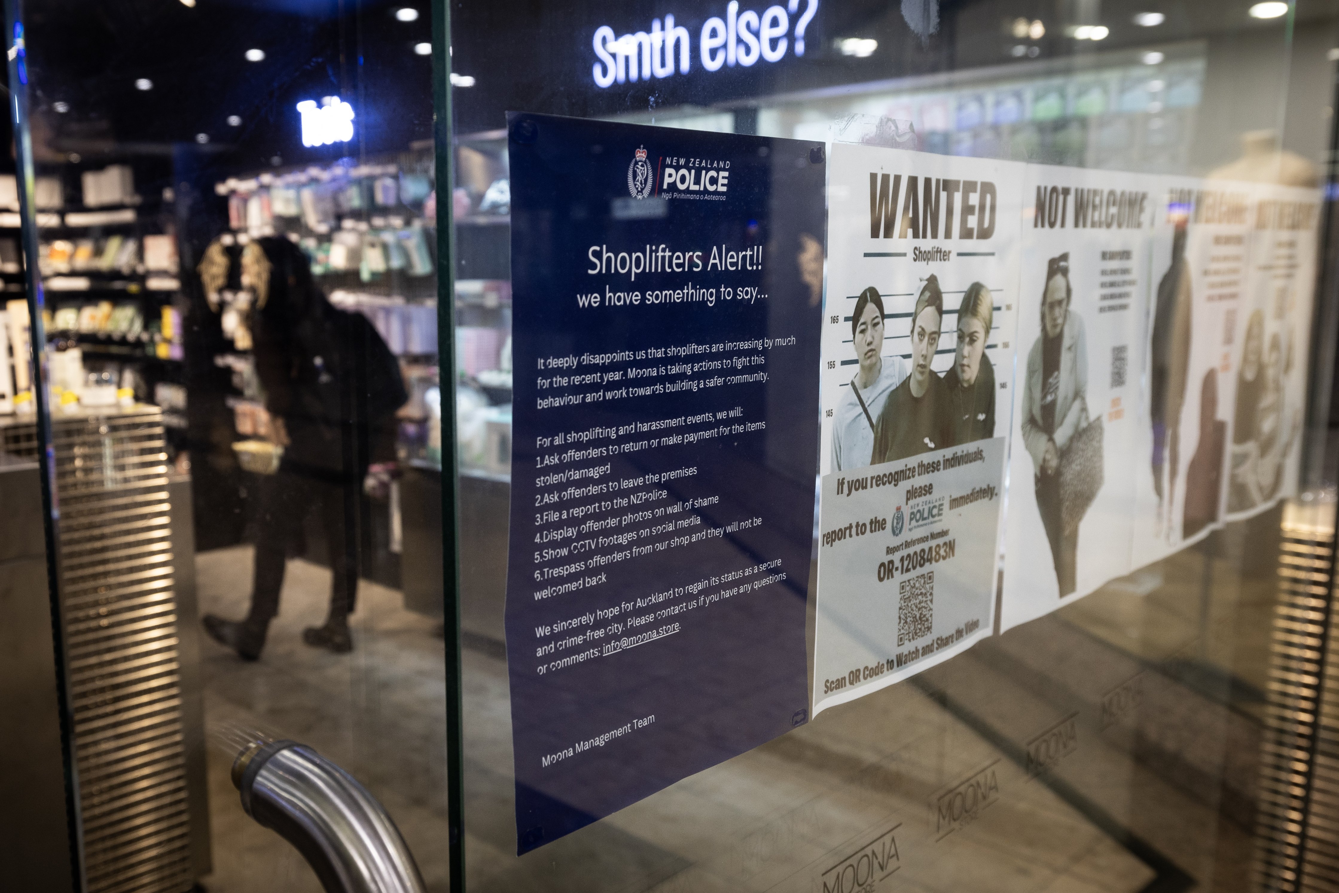 Enzo Wang has put up images of alleged shoplifters at the door of his Moona Store at MidCity Mall on Queen Street. Photo / Jason Oxenham