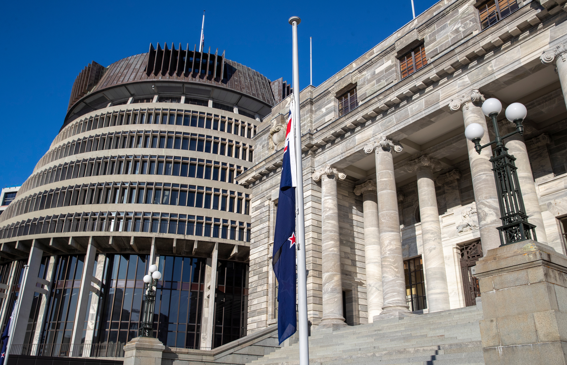 The NZ flag at half-mast at Parliament. Photo / Mark Mitchell