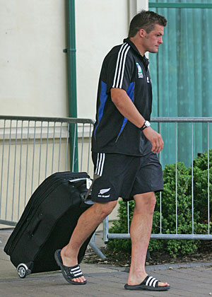 A dejected Richie McCaw checks out of his team's Cardiff hotel after the All Blacks were knocked out of the 2007 Rugby World Cup. Photo / Brett Phibbs
