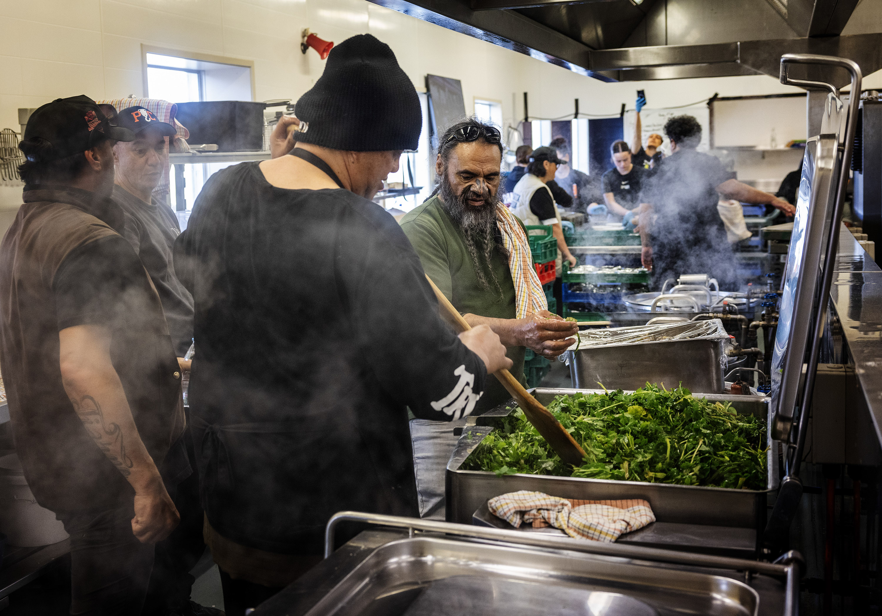 From the dungeon, the food makes its way up to the kitchen, a hive of steam and action.