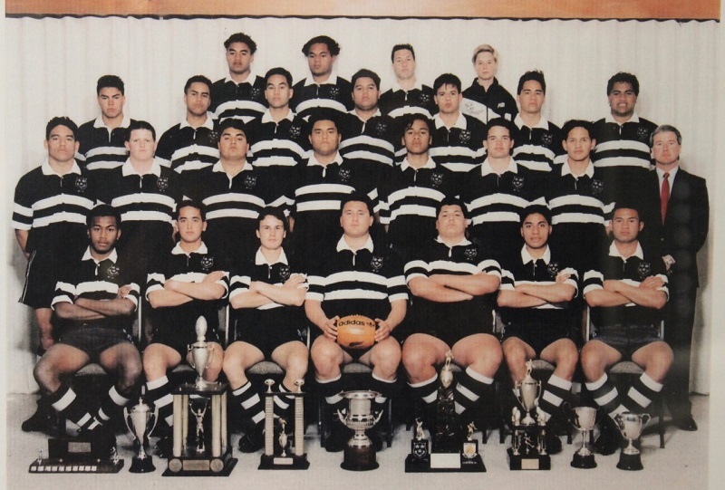 Rugby great Jonah Lomu (second row, fifth from left) and his mentor and First XV coach Chris Grinter (second row on the right) during their years at Auckland's Wesley College.