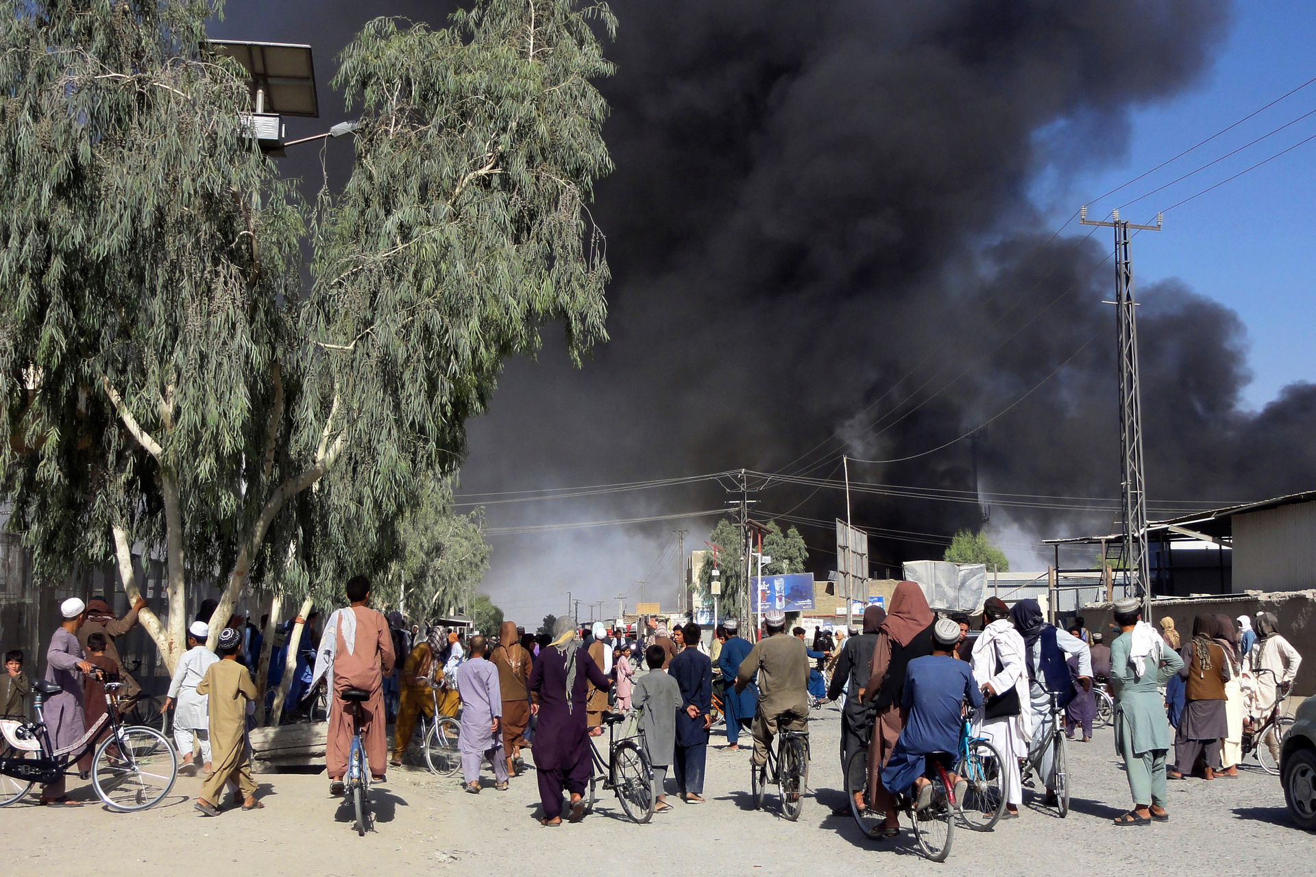 Plumes of smoke rise into the sky after fighting between the Taliban and Afghan security personnel in Kandahar, Afghanistan, southwest of Kabul. Photo / AP