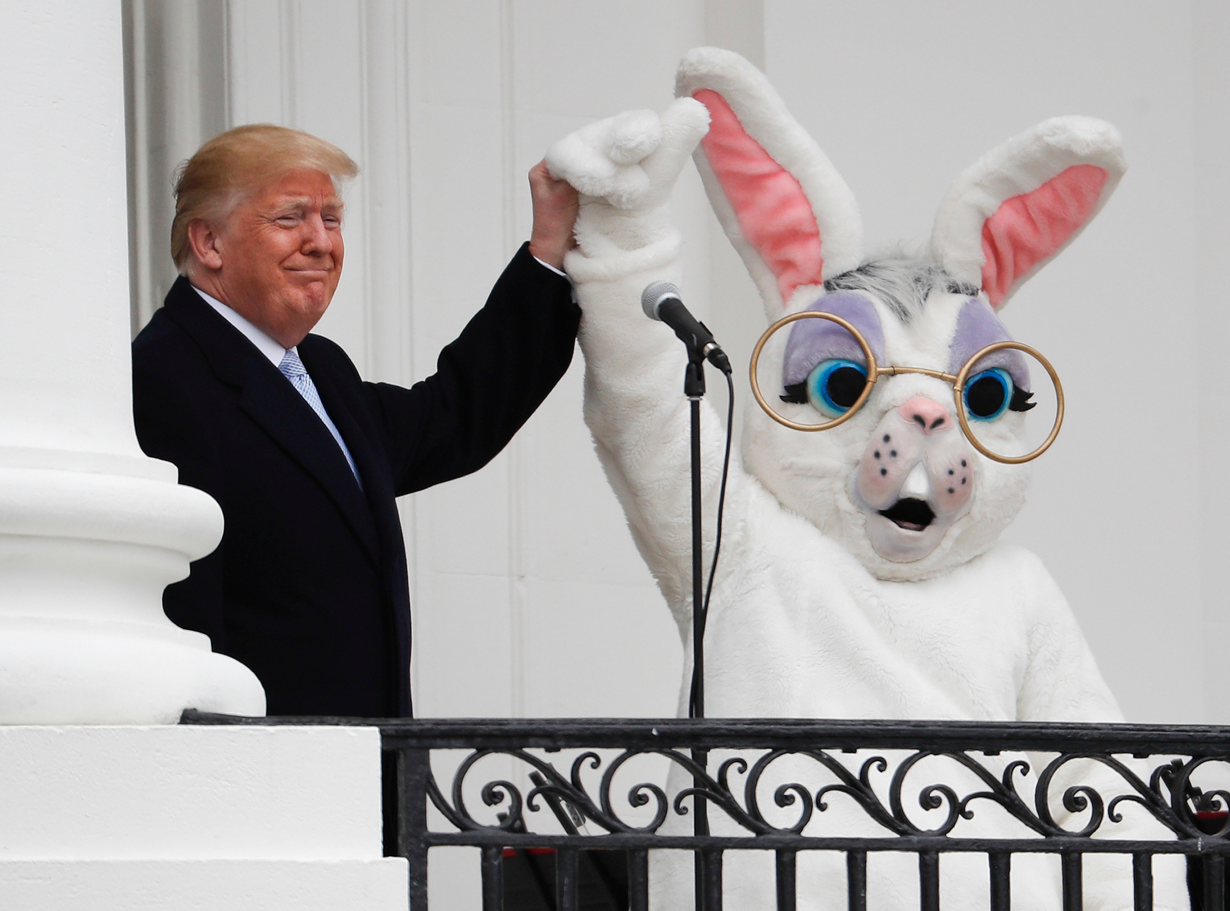 Donald Trump and the Easter Bunny, after speaking to the crowd on the Truman Balcony during the annual White House Easter Egg Roll on the South Lawn yesterday. Photo / AP