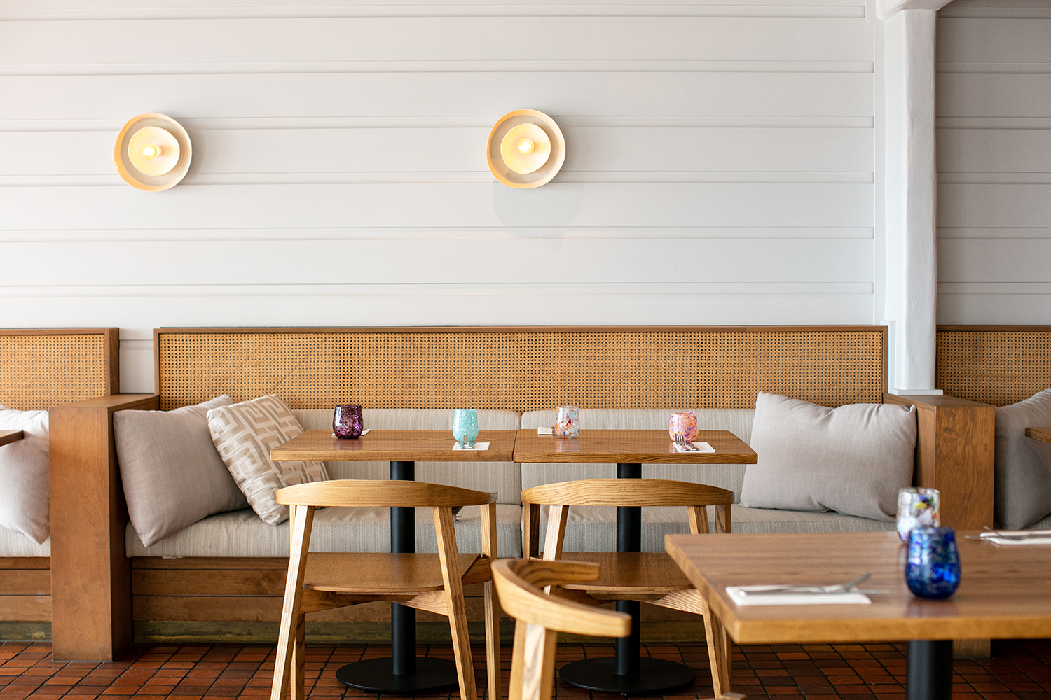 A neutral palette of crisp whites and wood accents makes Three Seven Two light and open. Photo / Babiche Martens