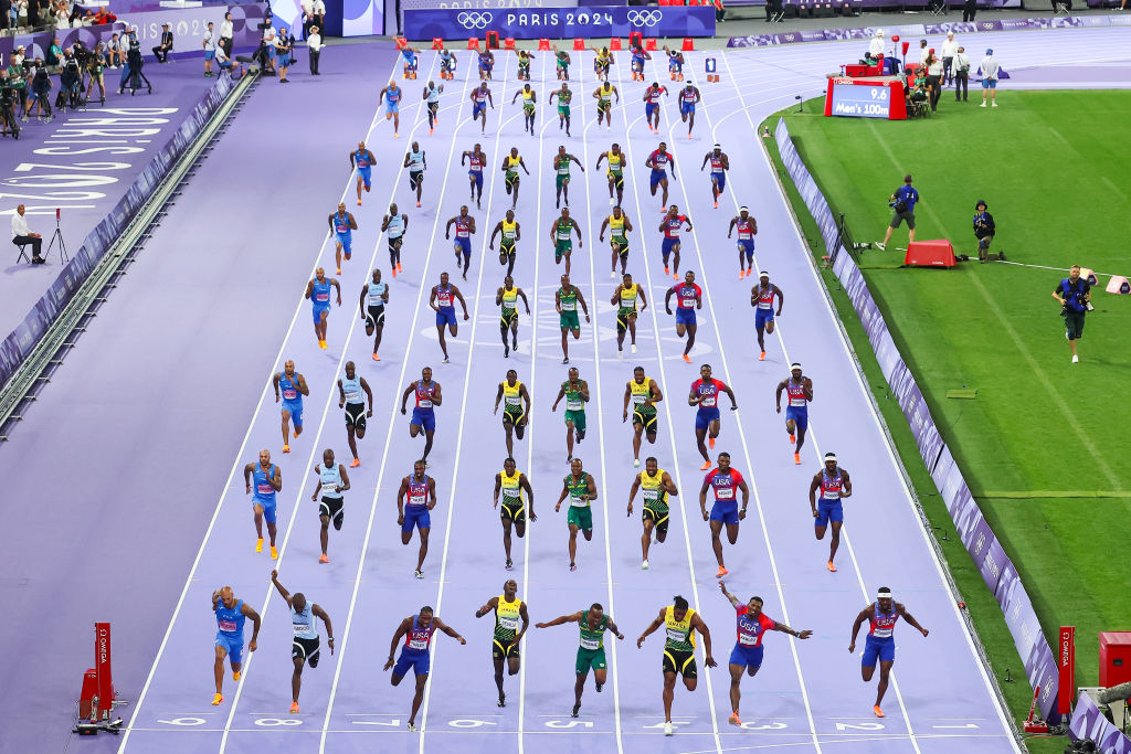 Noah Lyles had to work his way from the back to the front of the field in under 10 seconds. Photo / Getty Images