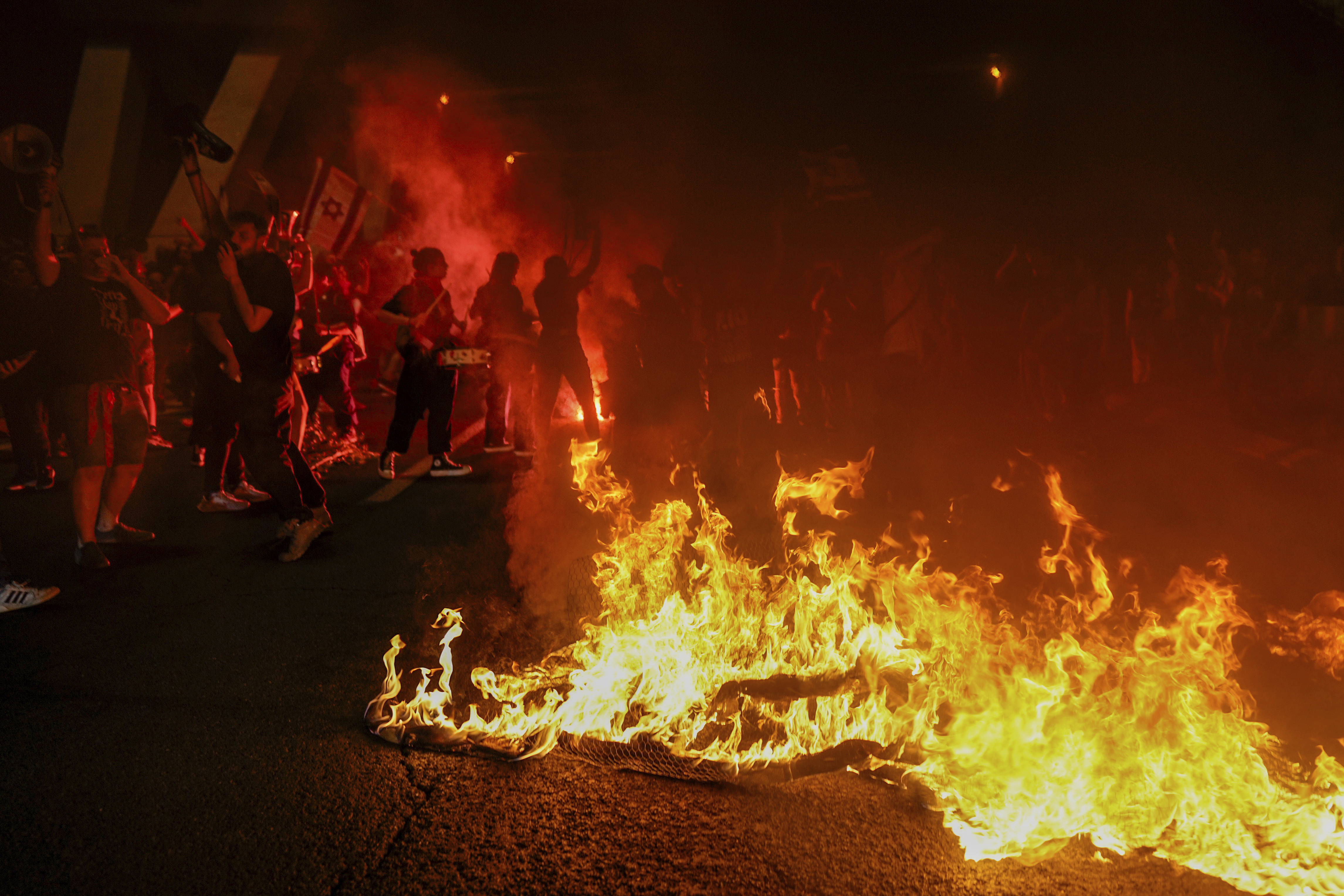 The protesters called for the release of hostages held in the Gaza Strip by the Hamas militant group. Photo / AP