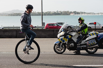 It takes all sorts: biking the bridge, May 30. Photo / Dean Purcell