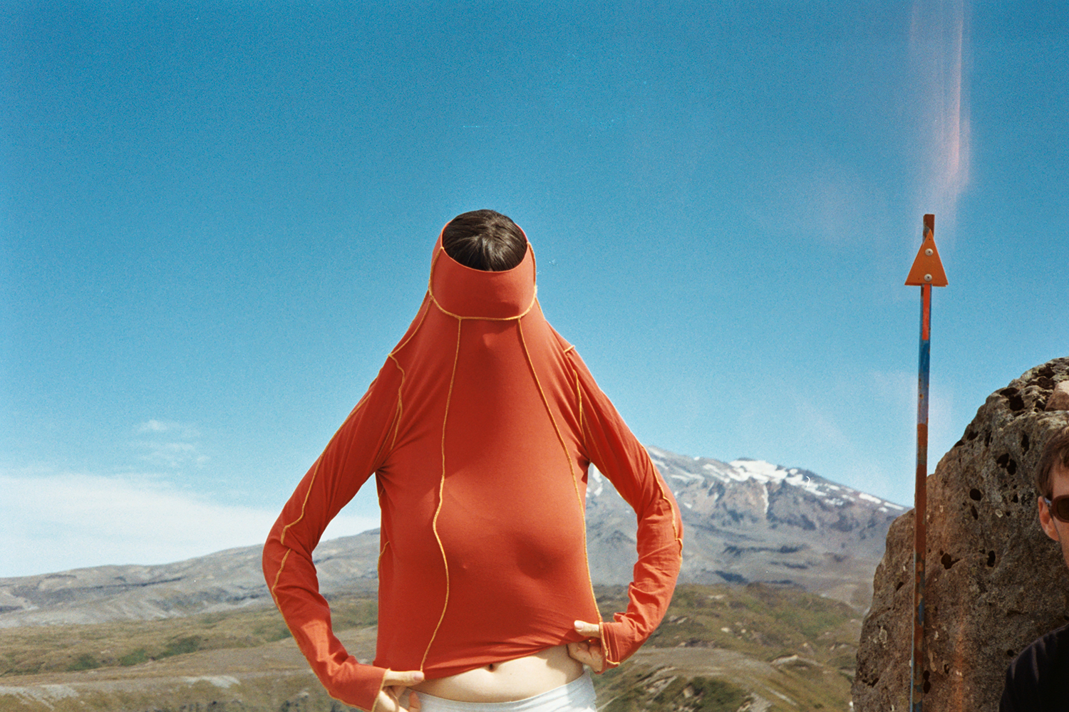 Hannah-Lee Jade orange Nature Tracks longsleeve top. Photo / Hannah-Lee Jade