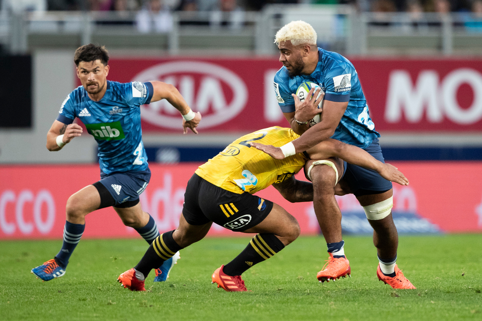 Blues No 8 Hoskins Sotutu on attack against the Hurricanes. Photo / Photosport