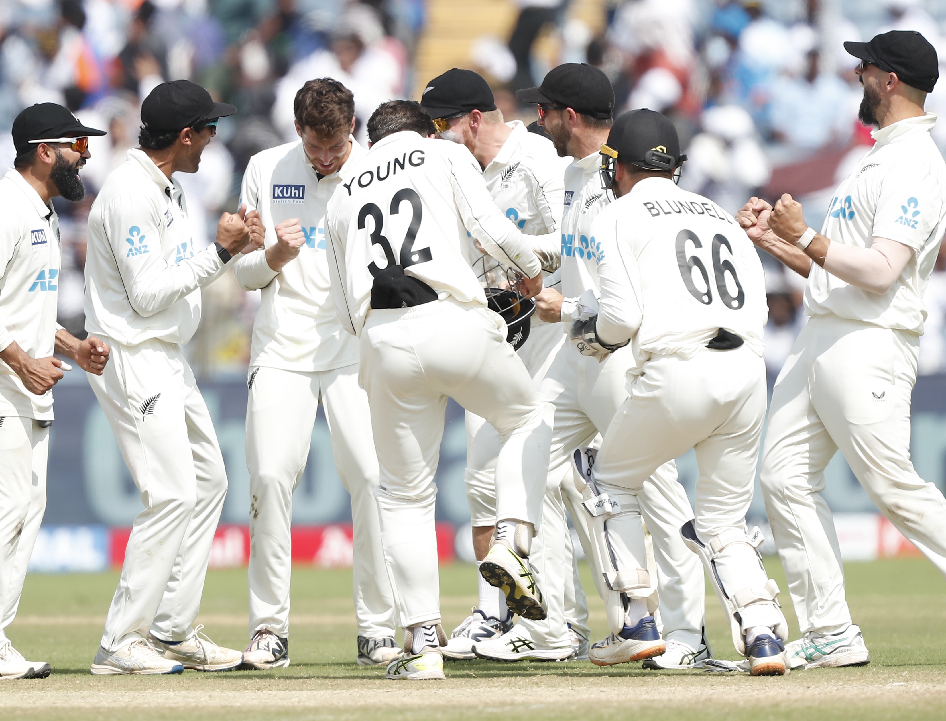 New Zealand celebrate Mitchell Santner's dismissal of Virat Kohli. Photo / Photosport