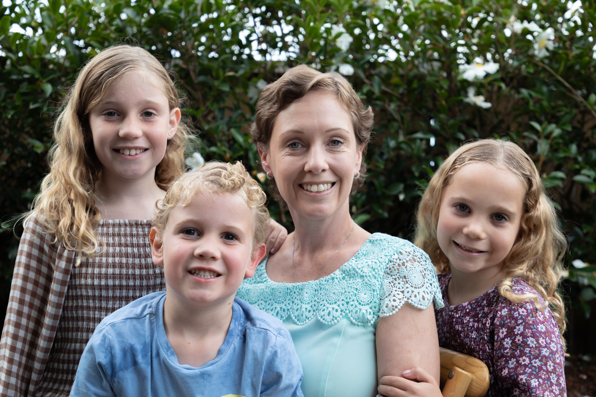 Celia Farnworth was diagnosed with ovarian cancer in April 2023. Pictured with her children Maya (9), Hunter (4) and Indie (7) Farnworth. Photo / Alex Cairns
