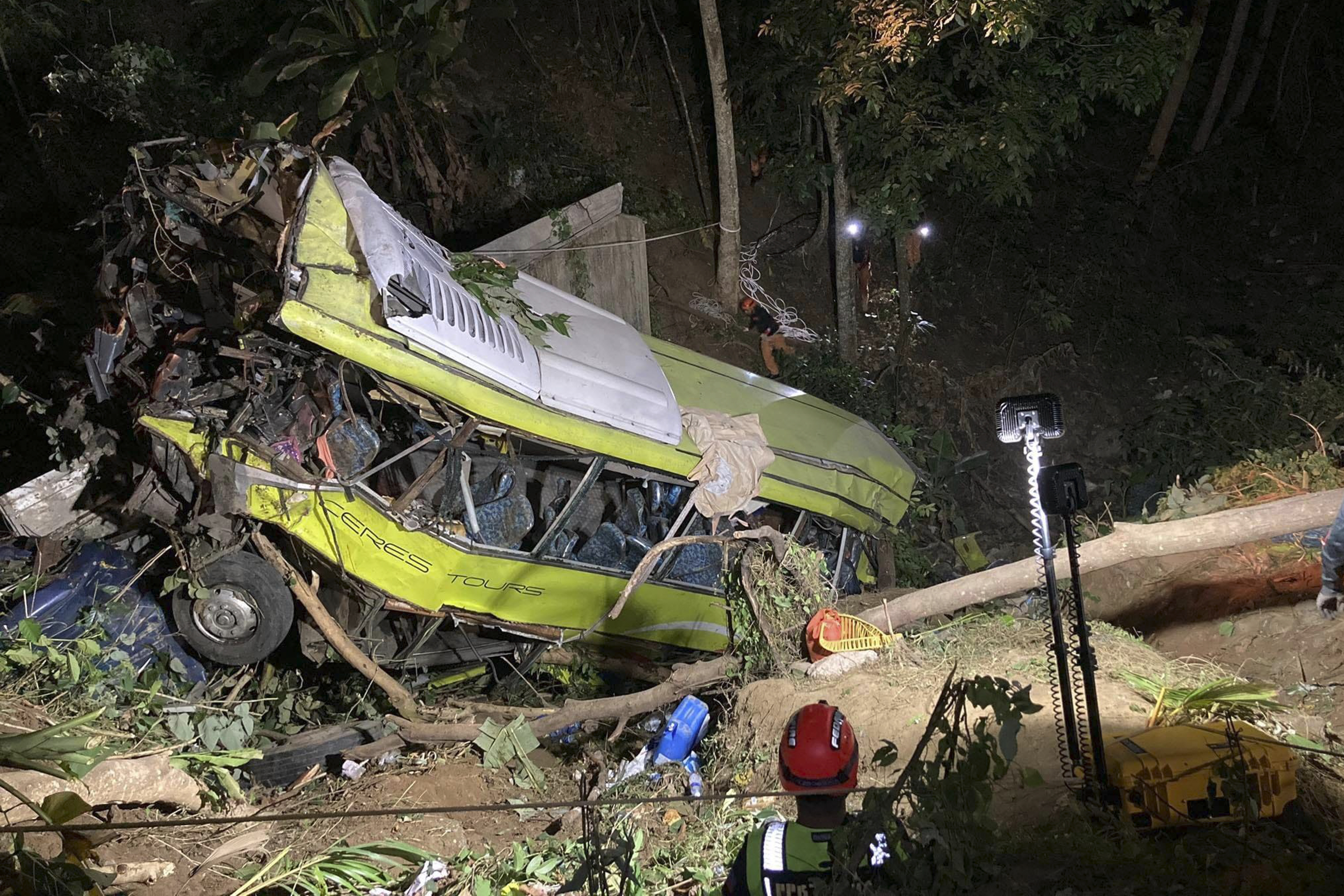 At least 16 dead and 12 injured as passenger bus falls off ravine in  central Philippines - NZ Herald
