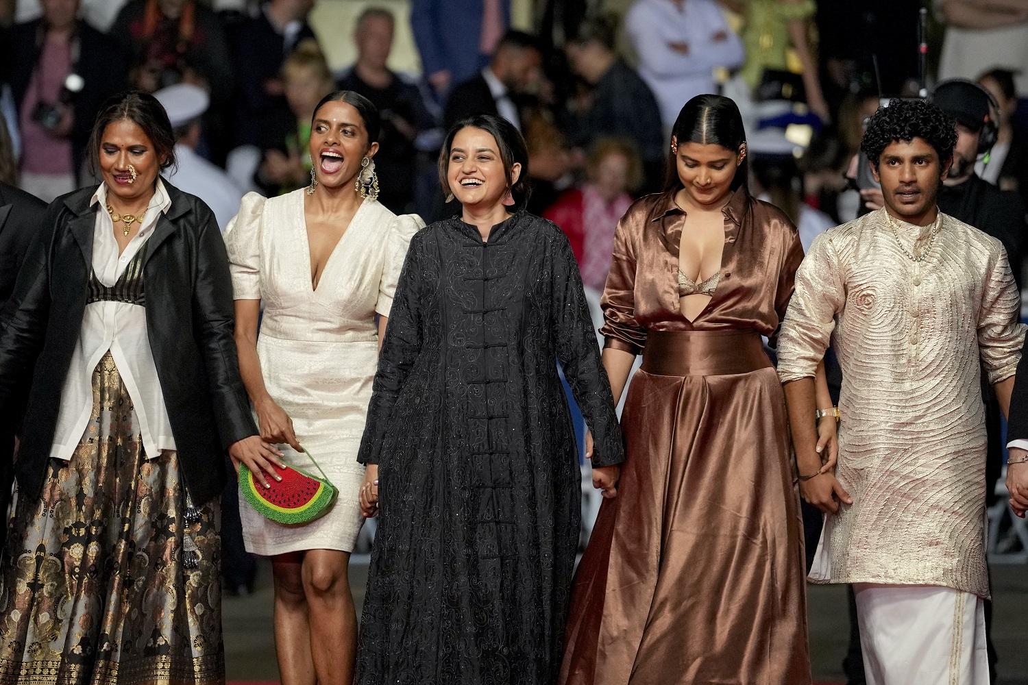 Chhaya Kadam, Kani Kusruti, Payal Kapadia, Divya Prabha and Hridhu Haroon at the All We Imagine as Light premiere at Cannes. The film was awarded the festival's prestigious Grand Prix prize. Photo / AP